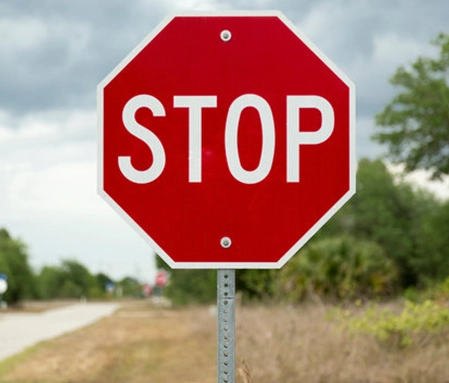 A newly installed stop sign.